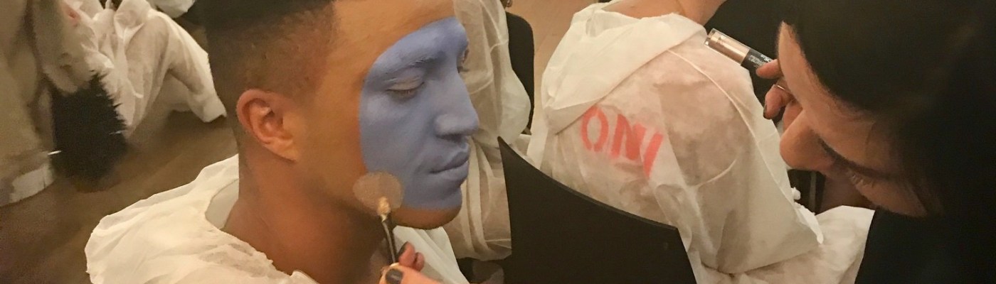 Nikki Taylor uses touchinSOL makeup on models backstage at the Vin + Omi London Fashion Week SS18 showcase